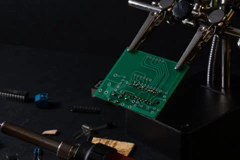 The components of the main board in the process of assembling the device Stock Photos