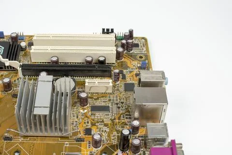 Components of microprocessor devices are installed on a printed circuit board 스톡 사진