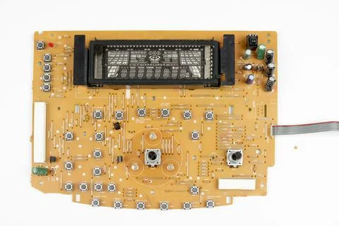 Components of microprocessor devices are installed on a printed circuit board Foto stock