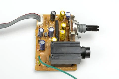 Components of microprocessor devices are installed on a printed circuit board Stockfoto's