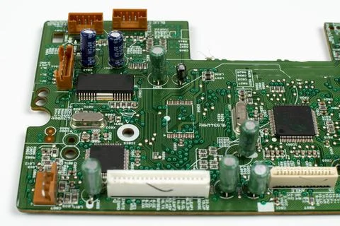 Components of microprocessor devices are installed on a printed circuit board 写真素材