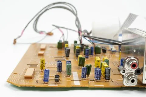 Components of microprocessor devices are installed on a printed circuit board 스톡 사진
