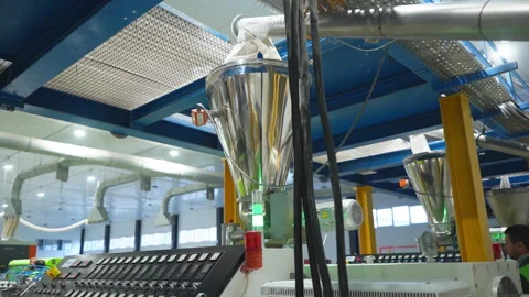 Components pouring dispenser with feeding pipe of shiny steel Stock Footage 304382910