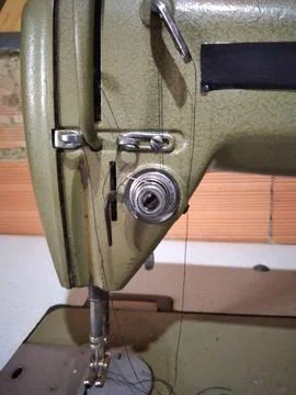 Components of a straight stitch sewing machine Stock Photos