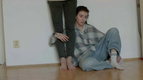 Composed pair experiencing serenity within their humble living environment Stock Footage 325530882