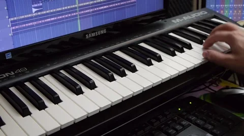 Composing the music. Video stock 64274778
