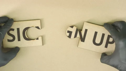Composing two jigsaw puzzle pieces with SIGN UP word Video stock 141948076