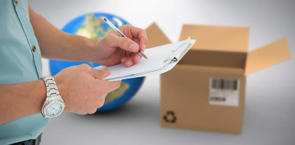 Composite 3d image of delivery man writing on clipboard 写真素材