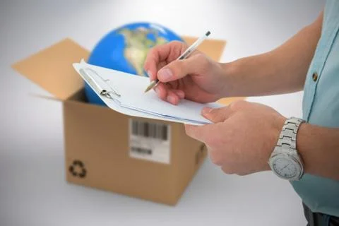 Composite 3d image of delivery man writing on clipboard Foto stock