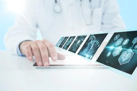 Composite 3d image of doctor using digital tablet against white background Stock Photos