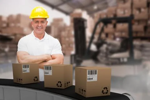 Composite 3d image of worker wearing hard hat in warehouse Foto stock
