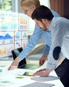 Composite collage. Team studying floating analytics dashboards with colorful Stock Photos