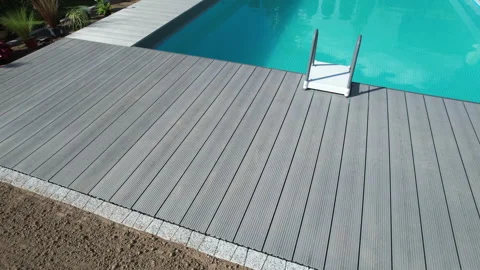 Composite Deck Next to Backyard Swimming Pool Stock Footage 275728090
