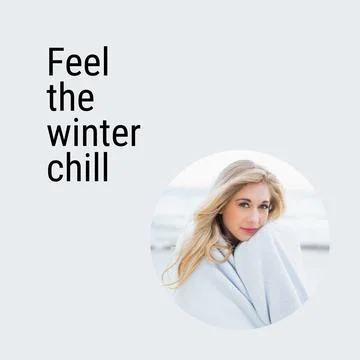 Composite of feel the winter chill text over happy caucasian woman in winter Foto stock
