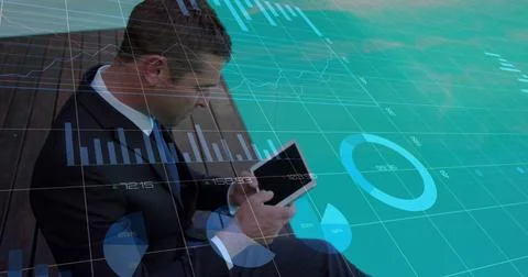 Composite of financial data processing over caucasian businessman using tablet Stock Photos