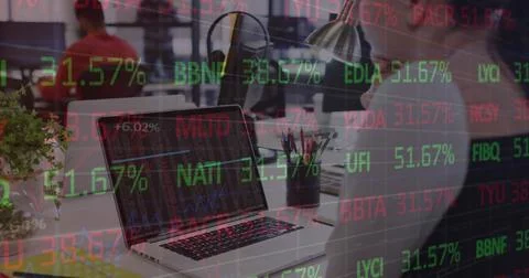 Composite of financial data processing over caucasian businesswoman using laptop Stock Photos