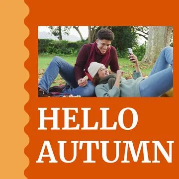 Composite of hello autumn text over happy diverse couple having picnic in autumn Fotos Stock