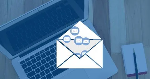 Composite of icons with open envelope over laptop and notepad on wooden table, Stock Illustration