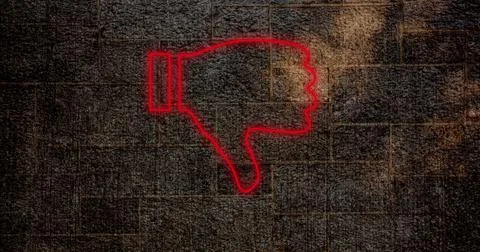 Composite of illuminated red dislike button icon against old grunge wall, copy Stock Photos