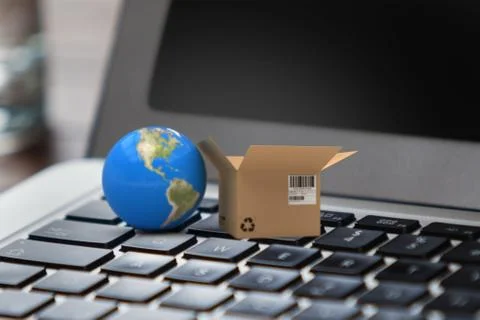 Composite image of 3d image of globe by cardboard box Stock Photos