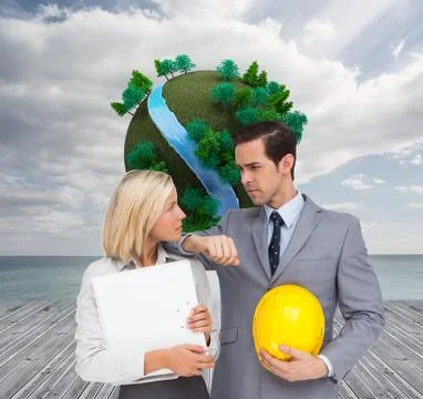 Composite image of architects with plans and hard hat looking at each other Stock Illustration