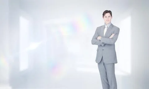 Composite image of assertive businessman standing Stock Photos
