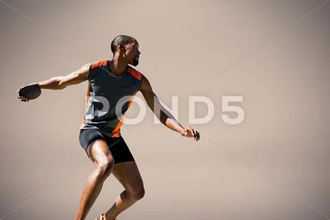 Composite image of athlete man throwing a discus Stock Photos