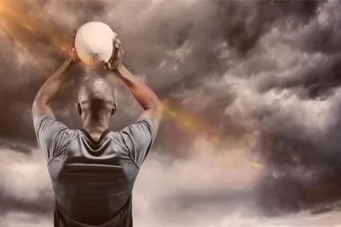Composite image of athlete throwing rugby ball 3D Stock Photos