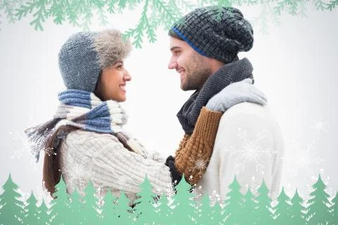 Composite image of attractive young couple in warm clothes hugging Illustrazione stock