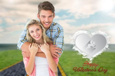 Composite image of attractive young couple smiling at camera Ilustração Stock