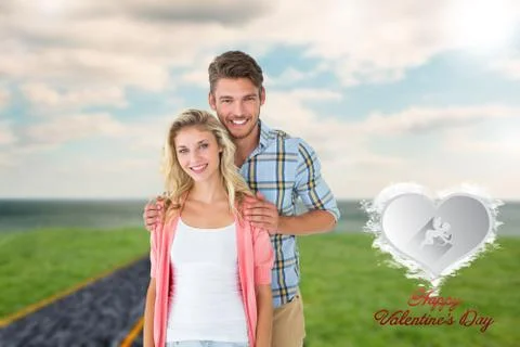 Composite image of attractive young couple smiling at camera Ilustração Stock