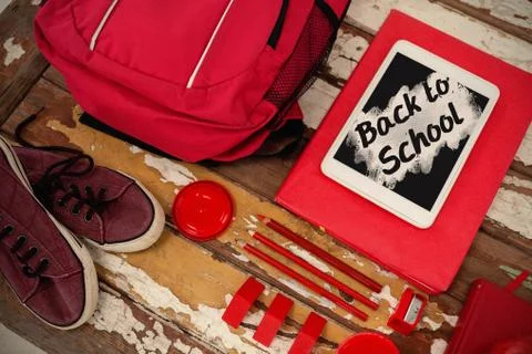 Composite image of back to school text on pink splash Stock Photos