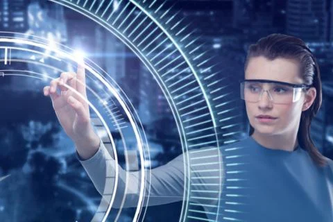 Composite image of beautiful woman using virtual reality glasses Foto stock