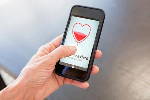 Composite image of become a hero text with heart shape on screen Stock Photos