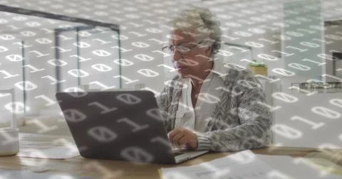 Composite image of binary coding data processing against african american senior Foto stock