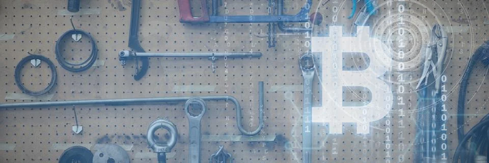 Composite image of bitcoin with binary code Stock Photos