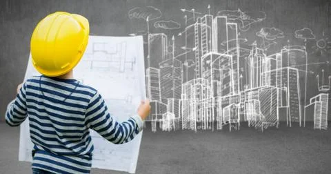 Composite image of boy in hard hat reading a plan Foto stock