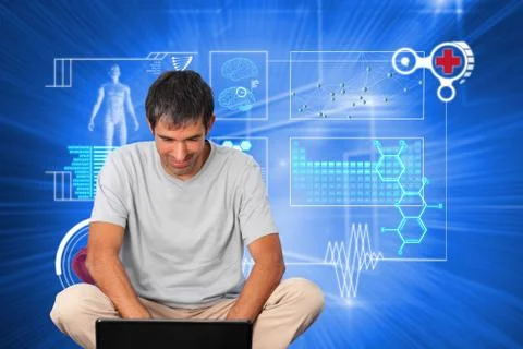 Composite image of bright man using a laptop Stockillustratie