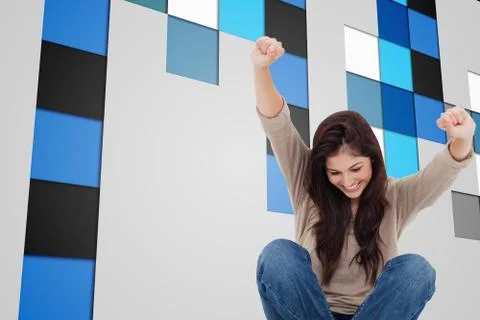 Composite image of brunette cheering while using laptop Illustrazione stock