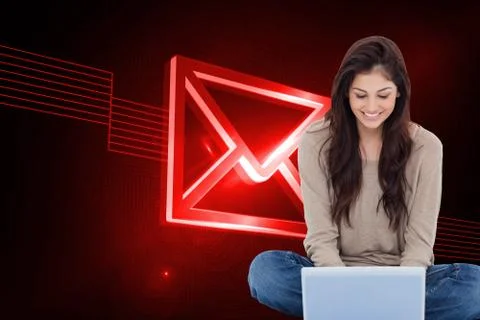 Composite image of brunette sitting on floor using laptop Illustrazione stock