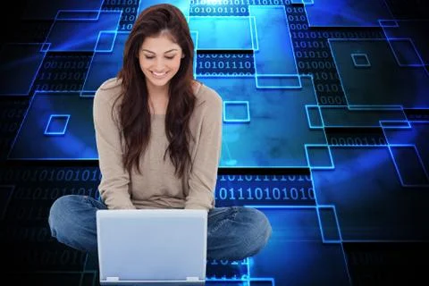 Composite image of brunette sitting using laptop イラスト素材