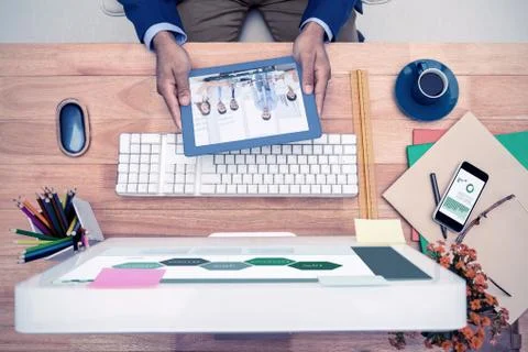 Composite image of business graphs Stock Photos