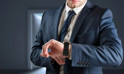 Composite image of businessman checking the time on watch Stock Illustration