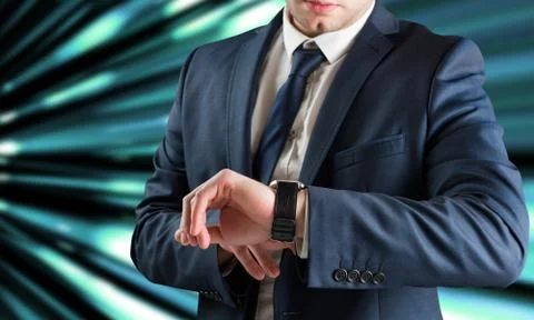 Composite image of businessman checking the time on watch Illustrazione stock