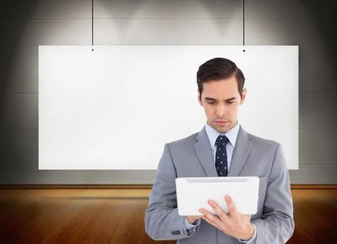 Composite image of businessman holding a tablet computer Stock Illustration
