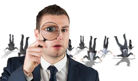 Composite image of businessman looking through magnifying glass イラスト素材