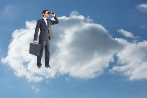 Composite image of businessman looking through binoculars Illustrazione stock