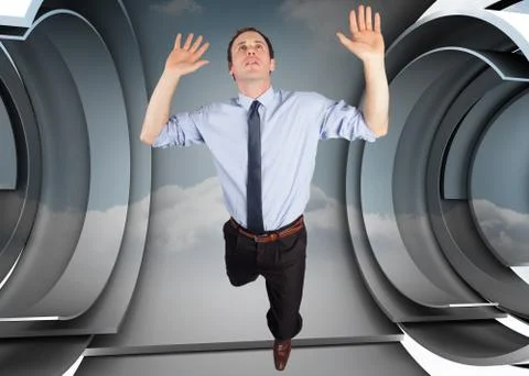 Composite image of businessman posing with arms raised Ilustración de archivo