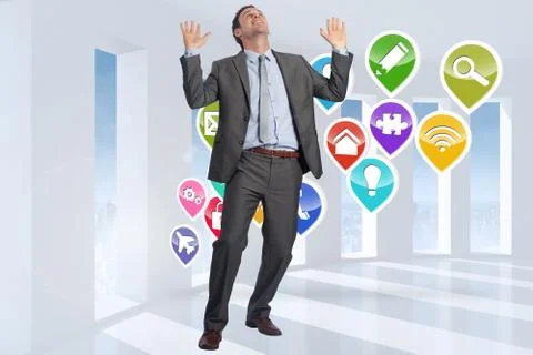 Composite image of businessman posing with arms raised Ilustración de archivo