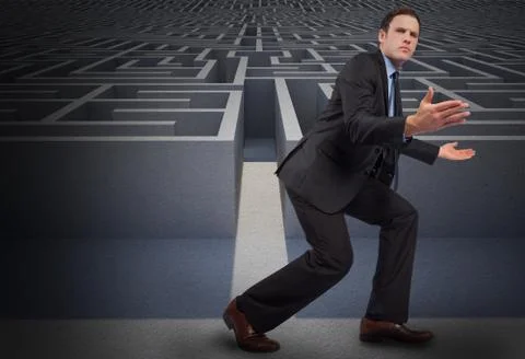 Composite image of businessman posing with arms outstretched Illustrazione stock